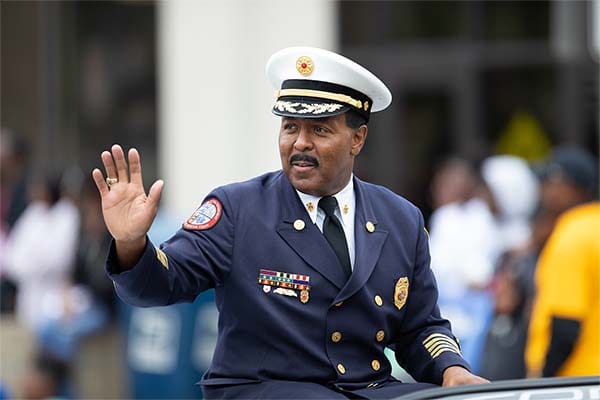 fire chief waving in a parade